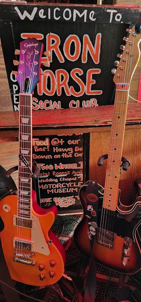 Guitars and hand-painted Iron Horse signs inside the club