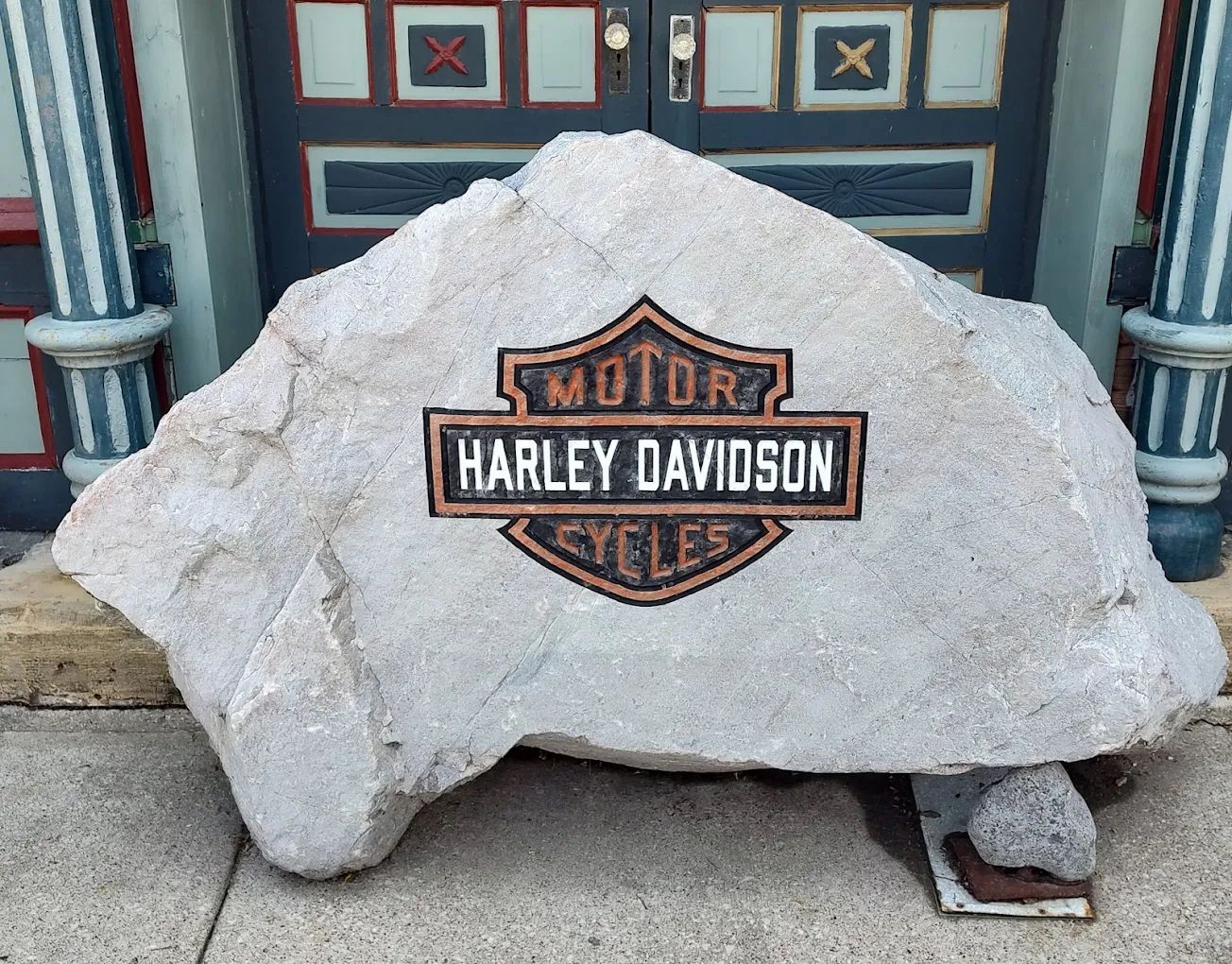 Carved stone motorcycle artwork